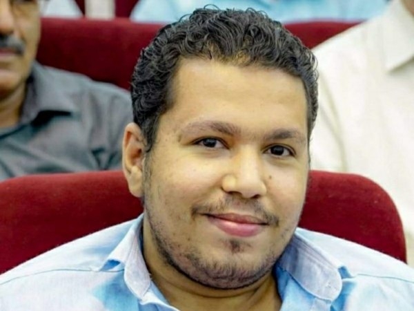 "الأمريكي للعدالة" يدعو النائب العام والانتقالي إلى الافراج الفوري عن الصحفي احمد ماهر
